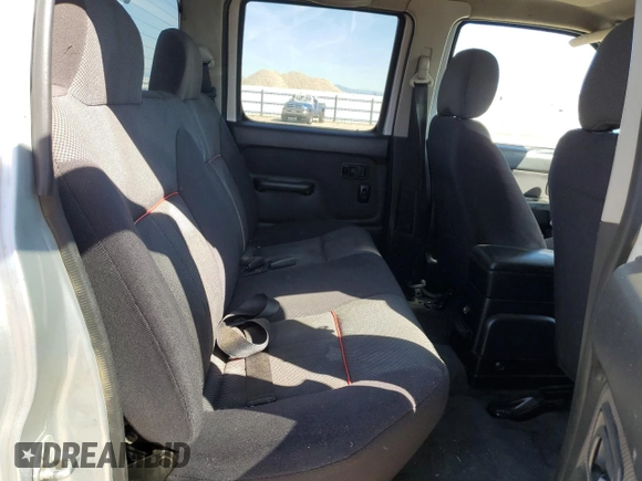 2002 Nissan Frontier z VIN 1N6MD29X62C380509, wystawiony jako Copart lot #50418365 z przebiegiem 223 541 mil mil oraz Czysty tytuł • Clean title. Historia ofert i sprzedaży dostępna na DreamBid. Obrazek 10.