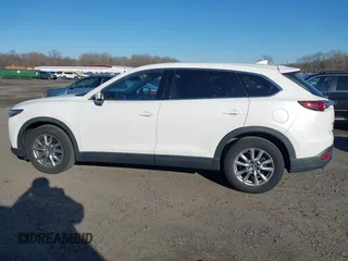 2016 Mazda CX-9 Touring with VIN JM3TCBCY5G0122551, listed as a IAAI auction lot 41613683 with 137,474 mi miles. Bid and sale history available at carsss.com. Image 14.