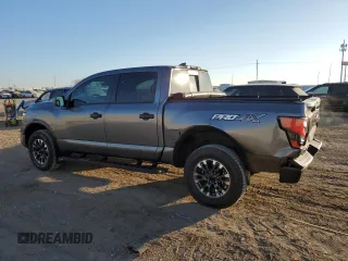 2024 Nissan Titan Pro-4X with VIN 1N6AA1ED7RN106901, listed as a Copart auction lot 43573995 with 42,973 mi miles and Salvage title. Bid and sale history available at DreamBid. Image 2.