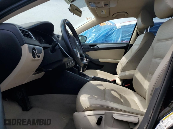2014 Volkswagen Jetta SE with VIN 3VWD17AJ6EM387167, listed as a Copart auction lot 52251955 with 150,441 mi miles and Salvage title. Bid and sale history available at DreamBid. Image 7.