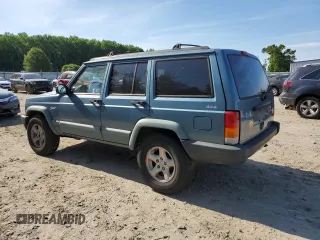 1998 Jeep Cherokee Sport with VIN 1J4FJ68S6WL283022, listed as a Copart auction lot 57451125 with 207,618 mi miles and Salvage title. Bid and sale history available at DreamBid. Image 2.