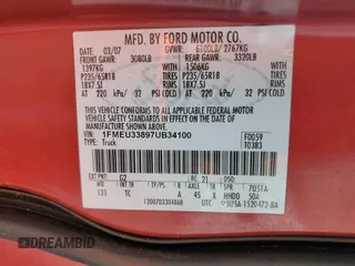 2007 Ford Explorer Sport Trac Limited with VIN 1FMEU33897UB34100, listed as a Copart auction lot 56944685 with 147,735 mi miles and Salvage title. Bid and sale history available at DreamBid. Image 12.