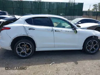 2020 Alfa Romeo Stelvio Ti z VIN ZASPAKBN9L7C76146, wystawiony jako IAAI lot #42038751 z przebiegiem 29 107 mil mil oraz . Historia ofert i sprzedaży dostępna na DreamBid. Obrazek 13.