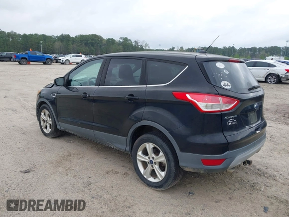 2016 Ford Escape SE with VIN 1FMCU9G99GUC13053, listed as a IAAI auction lot 41888535 with 84,019 mi miles. Bid and sale history available at carsss.com. Image 3.