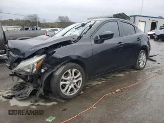2016 Scion iA z VIN 3MYDLBZV9GY129875, wystawiony jako Copart lot #81368604 z przebiegiem 82 111 mil mil oraz Szkody całkowita. Historia ofert i sprzedaży dostępna na DreamBid. Obrazek 1.