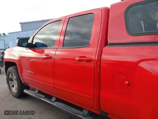 2018 Chevrolet Silverado 1500 LT with VIN 1GCVKREC3JZ170745, listed as a IAAI auction lot 41590416 with 124,577 mi miles. Bid and sale history available at carsss.com. Image 14.