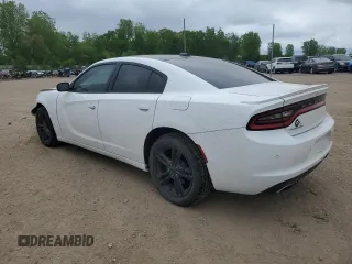 2015 Dodge Charger SXT with VIN 2C3CDXJG7FH779296, listed as a Copart auction lot 58490215 with 173,371 mi miles and Clean title. Bid and sale history available at DreamBid. Image 2.