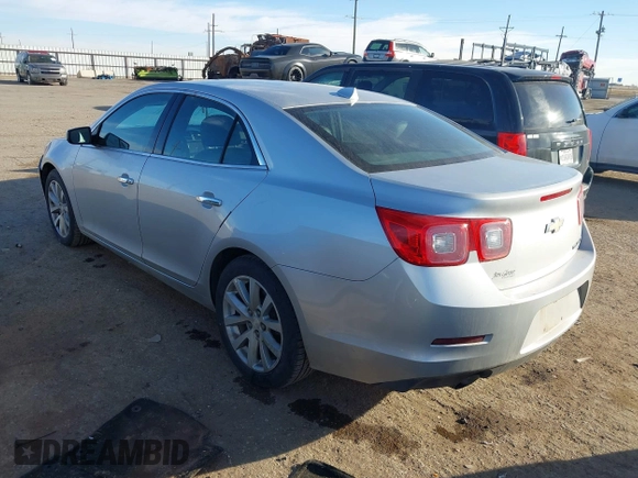 2013 Chevrolet Malibu LTZ with VIN 1G11H5SA7DU138464, listed as a IAAI auction lot 41517379 with 116,430 mi miles and . Bid and sale history available at DreamBid. Image 3.