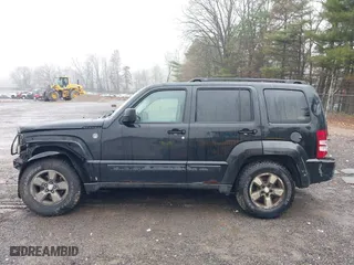 2008 Jeep Liberty Sport with VIN 1J8GN28K28W106520, listed as a IAAI auction lot 41995195 with 211,275 mi miles. Bid and sale history available at carsss.com. Image 14.