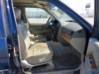 2002 Infiniti QX4 Luxury z VIN JNRDR09Y62W250391, wystawiony jako IAAI lot #42344733 z przebiegiem 97 818 mil mil oraz . Historia ofert i sprzedaży dostępna na DreamBid. Obrazek 5.