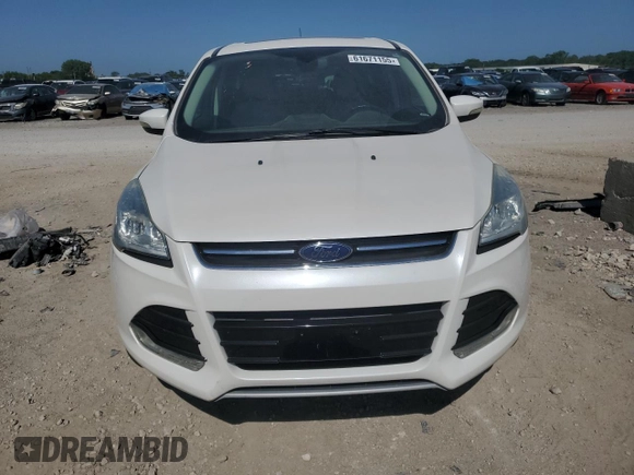 2013 Ford Escape SEL z VIN 1FMCU9H94DUC68911, wystawiony jako Copart lot #61671155 z przebiegiem 165 985 mil mil oraz Szkoda całkowita • Salvage title. Historia ofert i sprzedaży dostępna na DreamBid. Obrazek 5.
