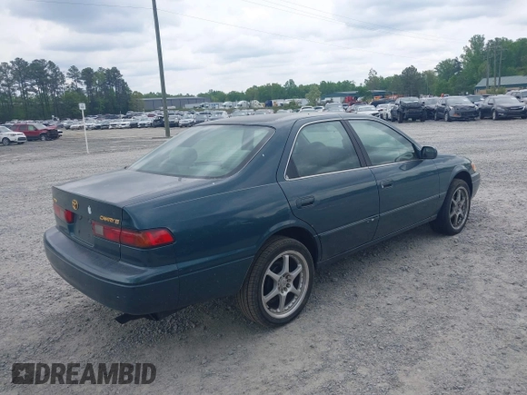 1997 Toyota Camry LE z VIN 4T1BG22K7VU005271, wystawiony jako IAAI lot #42098097 z przebiegiem Nie podano mil oraz . Historia ofert i sprzedaży dostępna na DreamBid. Obrazek 4.