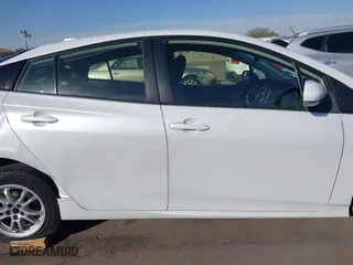 2021 Toyota Prius L Eco with VIN JTDKAMFU7M3133544, listed as a IAAI auction lot 41548653 with 115,214 mi miles. Bid and sale history available at carsss.com. Image 14.