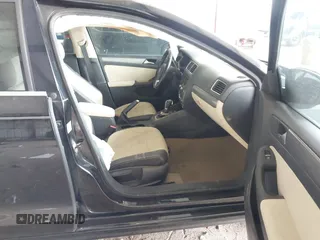 2012 Volkswagen Jetta Sedan SEL w/Sunroof with VIN 3VWLX7AJ5CM379634, listed as a IAAI auction lot 41634048 with 209,586 mi miles. Bid and sale history available at carsss.com. Image 5.