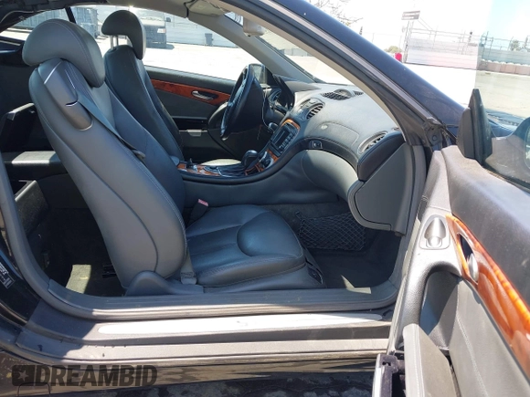 2003 Mercedes-Benz SL 500 with VIN WDBSK75F23F015866, listed as a IAAI auction lot 42415510 with 141,049 mi miles and . Bid and sale history available at DreamBid. Image 5.