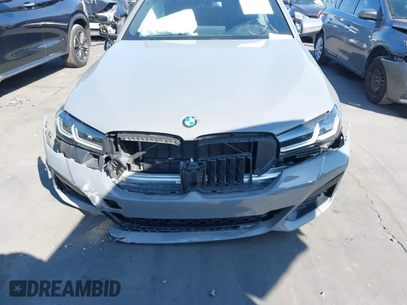2022 BMW 5 Series M550i xDrive with VIN WBA13BK02NCJ61943, listed as a IAAI auction lot 41607980 with Not provided miles and . Bid and sale history available at DreamBid. Image 13.