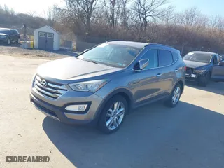 2013 Hyundai Santa Fe 2.0T Sport with VIN 5XYZUDLA9DG081491, listed as a IAAI auction lot 41679285 with 94,520 mi miles. Bid and sale history available at carsss.com. Image 2.