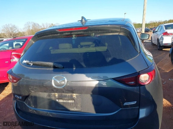 2019 Mazda CX-5 Touring with VIN JM3KFACM0K0668242, listed as a IAAI auction lot 41308376 with NaN miles. Bid and sale history available at carsss.com. Image 16.
