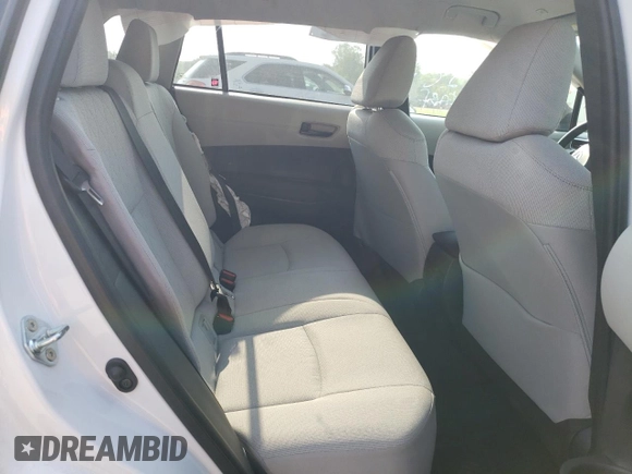 2023 Toyota Corolla Cross LE with VIN 7MUCAABG3PV060880, listed as a Copart auction lot 59664915 with 18,246 mi miles and Salvage title. Bid and sale history available at DreamBid. Image 11.