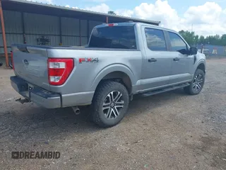 2023 Ford F-150 XL with VIN 1FTFW1E55PKE96110, listed as a IAAI auction lot 42127827 with 35,741 mi miles and . Bid and sale history available at DreamBid. Image 4.