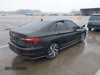 2021 Volkswagen Jetta GLI S with VIN 3VW6T7BU1MM021661, listed as a IAAI auction lot 41563793 with 124,250 mi miles and . Bid and sale history available at DreamBid. Image 4.