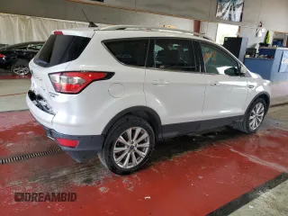 2018 Ford Escape Titanium с VIN 1FMCU9J90JUB30658, выставлен на аукционе Copart как лот 64001665 с пробегом 61 970 миль миль и Списание • Salvage title. История ставок и продаж доступна на DreamBid. Изображение 3.