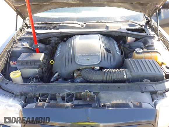 2005 Chrysler 300 with VIN 2C3AA63HX5H649107, listed as a IAAI auction lot 41748562 with 173,803 mi miles. Bid and sale history available at carsss.com. Image 10.