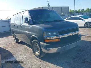 2014 Chevrolet Express Cargo z VIN 1GCWGFCA9E1144113, wystawiony jako IAAI lot #42609171 z przebiegiem 196 490 mil mil oraz . Historia ofert i sprzedaży dostępna na DreamBid. Obrazek 1.