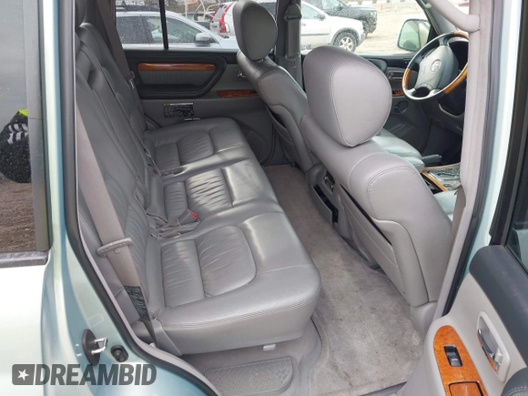 2004 Lexus LX 470 z VIN JTJHT00W143546192, wystawiony jako IAAI lot #41673810 z przebiegiem 232 196 mil mil oraz . Historia ofert i sprzedaży dostępna na DreamBid. Obrazek 8.
