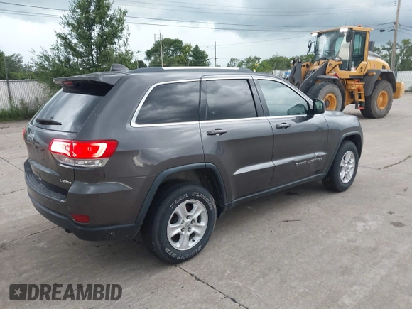 2017 Jeep Grand Cherokee Laredo with VIN 1C4RJFAG1HC604461, listed as a IAAI auction lot 42685509 with 143,462 mi miles and . Bid and sale history available at DreamBid. Image 4.