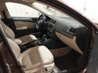 2014 Volkswagen Jetta TDI w/Premium with VIN 3VWLL7AJ1EM358214, listed as a IAAI auction lot 42148435 with 174,923 mi miles and . Bid and sale history available at DreamBid. Image 5.