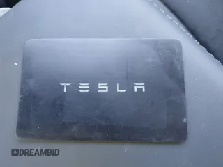 2025 Tesla Model 3 Long Range with VIN 5YJ3E1EA2SF915586, listed as a IAAI auction lot 41495870 with 4 mi miles and . Bid and sale history available at DreamBid. Image 11.