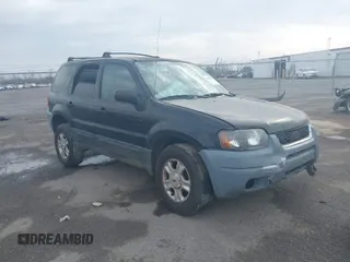 2004 Ford Escape XLT with VIN 1FMCU03114KB25567, listed as a IAAI auction lot 41559575 with 238,685 mi miles. Bid and sale history available at carsss.com. Image 1.