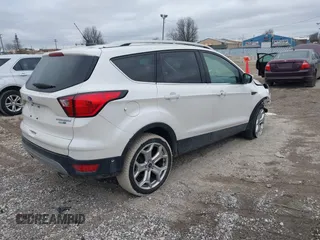 2019 Ford Escape Titanium with VIN 1FMCU9J95KUB50793, listed as a IAAI auction lot 41501161 with 111,644 mi miles. Bid and sale history available at carsss.com. Image 4.