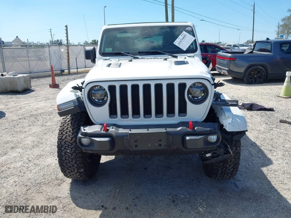 2021 Jeep Wrangler Unlimited Rubicon with VIN 1C4HJXFN9MW519496, listed as a IAAI auction lot 41676845 with 72,767 mi miles. Bid and sale history available at carsss.com. Image 12.