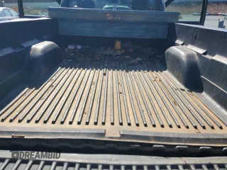 2004 GMC Sierra 1500 Work Truck z VIN 1GTEK14X34Z257653, wystawiony jako Copart lot #43521535 z przebiegiem Nie podano mil oraz Szkody całkowita. Historia ofert i sprzedaży dostępna na DreamBid. Obrazek 11.