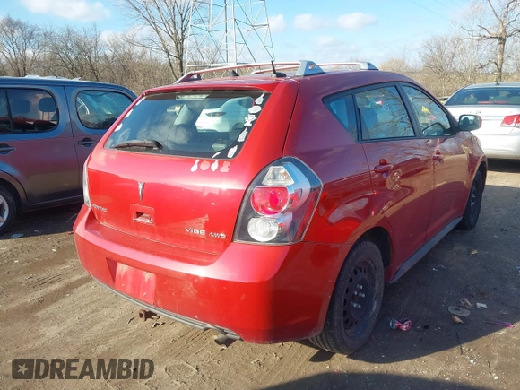 2009 Pontiac Vibe with VIN 5Y2SM670X9Z402770, listed as a IAAI auction lot 41200223 with 174,891 mi miles. Bid and sale history available at carsss.com. Image 4.
