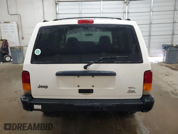 1997 Jeep Cherokee Sport with VIN 1J4FJ68S2VL518188, listed as a Copart auction lot 77459464 with 0 mi miles and Non Repairable. Bid and sale history available at carsss.com. Image 6.