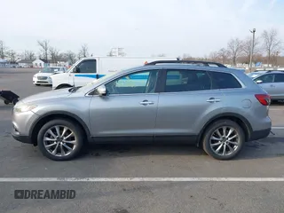 2015 Mazda CX-9 Grand Touring with VIN JM3TB3DA6F0447184, listed as a IAAI auction lot 41771865 with 137,814 mi miles. Bid and sale history available at carsss.com. Image 14.