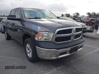 2018 Ram 1500 Tradesman z VIN 1C6RR6KM9JS274424, wystawiony jako IAAI lot #41549249 z przebiegiem 103 022 mil mil oraz . Historia ofert i sprzedaży dostępna na DreamBid. Obrazek 1.