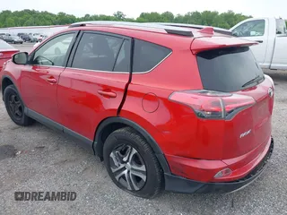 2017 Toyota RAV4 LE with VIN JTMBFREV8HJ161427, listed as a IAAI auction lot 42333851 with 121,161 mi miles and . Bid and sale history available at DreamBid. Image 3.