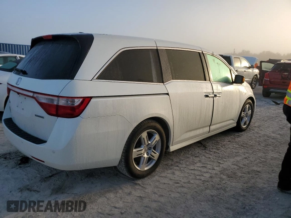 2012 Honda Odyssey Touring with VIN 5FNRL5H96CB144690, listed as a Copart auction lot 75176494 with 0 mi miles and Salvage Title. Bid and sale history available at carsss.com. Image 3.