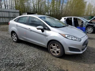 2015 Ford Fiesta SE with VIN 3FADP4BJ9FM198745, listed as a Copart auction lot 51916195 with 116,763 mi miles and Salvage Title. Bid and sale history available at DreamBid. Image 4.