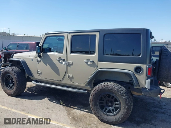 2017 Jeep Wrangler Unlimited Sahara with VIN 1C4BJWEG1HL746854, listed as a IAAI auction lot 41948127 with 97,730 mi miles. Bid and sale history available at carsss.com. Image 14.