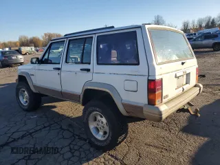 1993 Jeep Cherokee Country with VIN 1J4FJ78S0PL565292, listed as a Copart auction lot 83214974 with 233,925 mi miles and Clean Title. Bid and sale history available at carsss.com. Image 2.