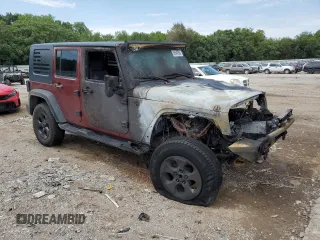 2007 Jeep Wrangler Unlimited Sahara z VIN 1J8GB59107L203053, wystawiony jako Copart lot #66549364 z przebiegiem Nie podano mil oraz Szkoda całkowita • Salvage title. Historia ofert i sprzedaży dostępna na DreamBid. Obrazek 4.