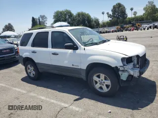 2007 Ford Escape Hybrid with VIN 1FMCU49H87KB61613, listed as a Copart auction lot 58083235 with 129,049 mi miles and Salvage title. Bid and sale history available at DreamBid. Image 4.
