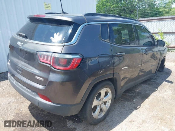 2018 Jeep Compass Latitude z VIN 3C4NJDBB7JT103901, wystawiony jako IAAI lot #42358749 z przebiegiem 91 083 mil mil oraz . Historia ofert i sprzedaży dostępna na DreamBid. Obrazek 4.