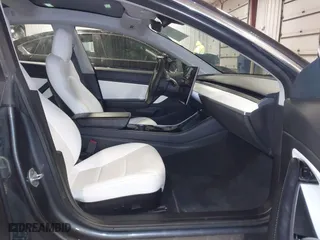 2020 Tesla Model 3 Performance with VIN 5YJ3E1EC3LF641768, listed as a IAAI auction lot 41542615 with 43,343 mi miles. Bid and sale history available at carsss.com. Image 5.