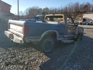 1986 Ford F-150 with VIN 1FTEF14H7GNB46015, listed as a Copart auction lot 80076324 with 0 mi miles and Salvage Title. Bid and sale history available at carsss.com. Image 3.